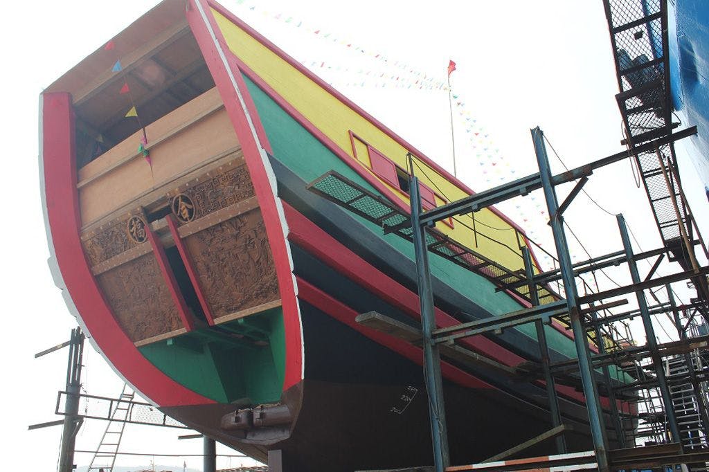 Fixtech FMP100 wood to wood adhesive bonding teak panels on this Chinese Junk being build in Zhoushan China